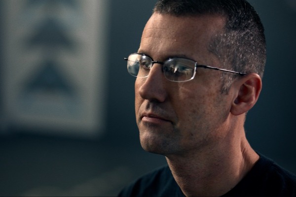 still frame from a patient testimonial video, physical therapist clinic