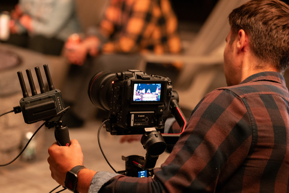 commercial video production behind the scenes. Canon cinema camera on gimbal with wireless image transmission